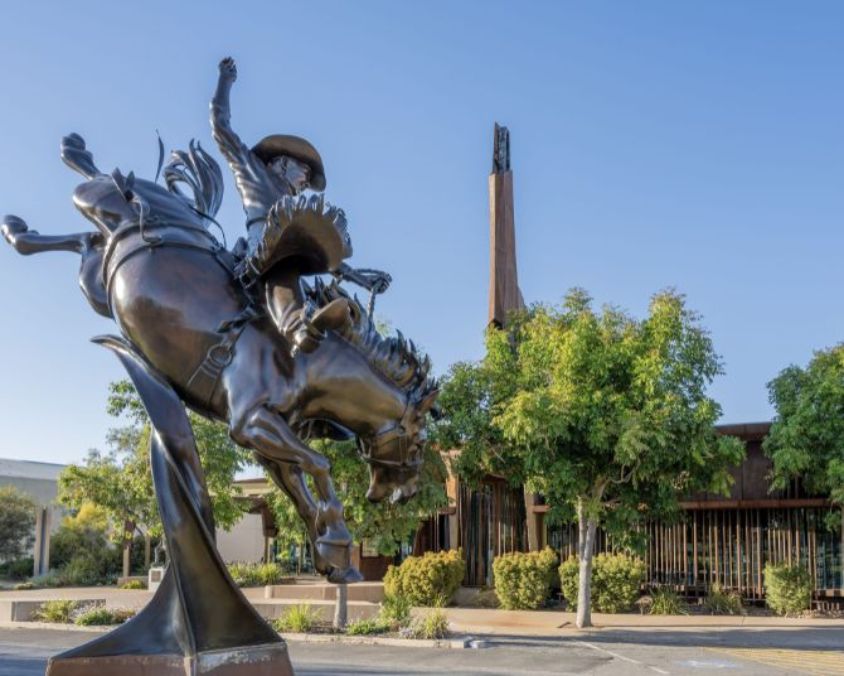 Bronze statue of a rodeo rider at the Waltzing Matilda Centre.